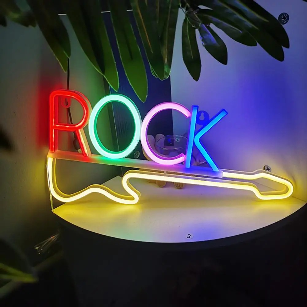 led neonskilt på veggen - rockegitar
